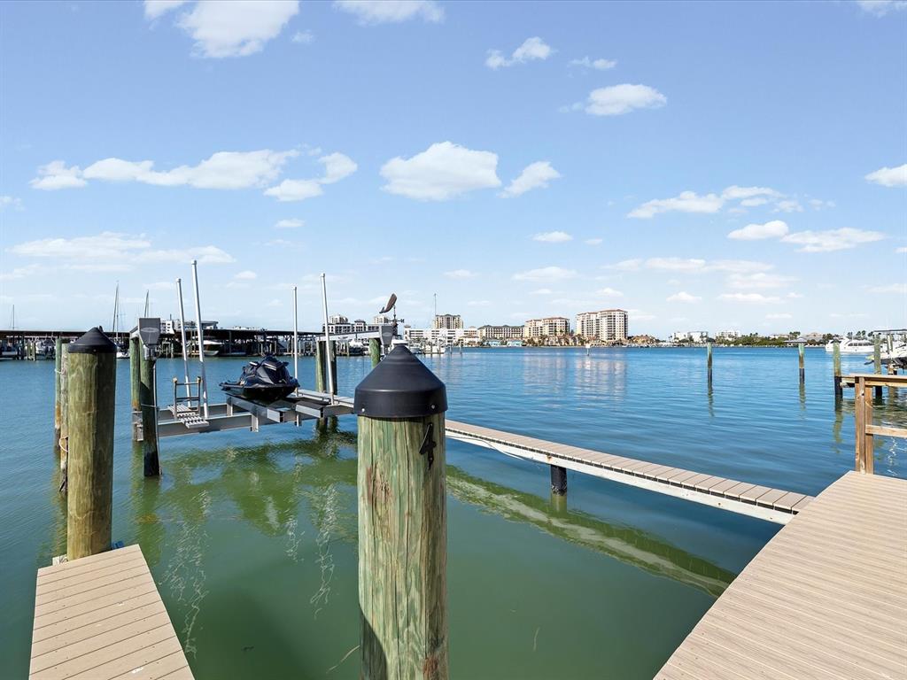 205 Dolphin Point, Unit 4 Clearwater Beach, FL 33767 - Photo 20 of 23 a view of a lake