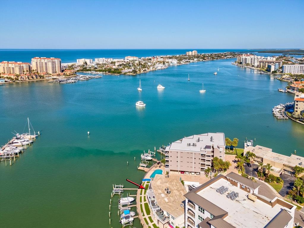 205 Dolphin Point, Unit 4 Clearwater Beach, FL 33767 - Photo 23 of 23 an aerial view of a house with a lake view