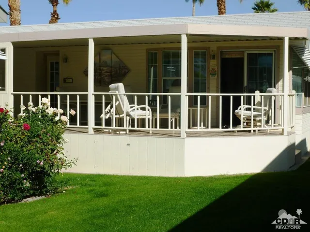 a view of a house with a deck