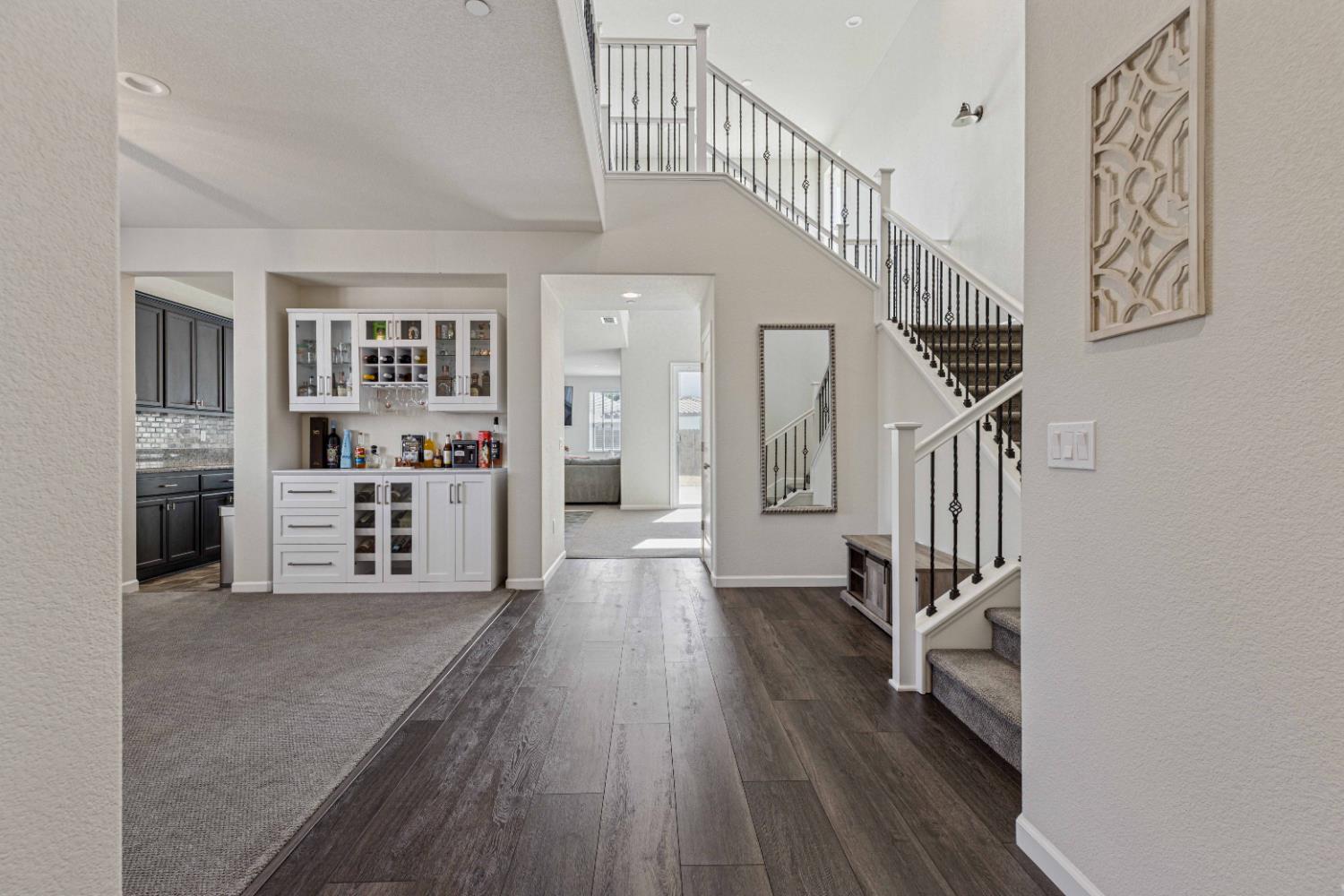 3264 Showcase Way Modesto, CA 95356 - Photo 1 of 31 a view of entryway and hall with wooden floor