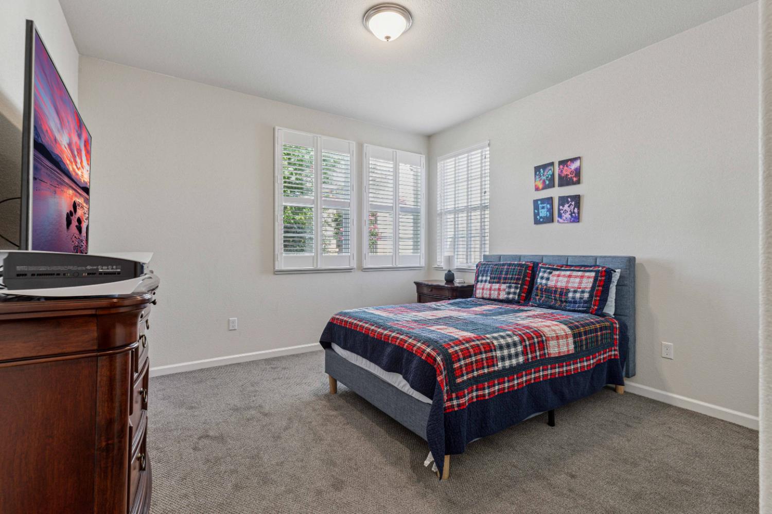 3264 Showcase Way Modesto, CA 95356 - Photo 14 of 31 a spacious bedroom with a bed and a window