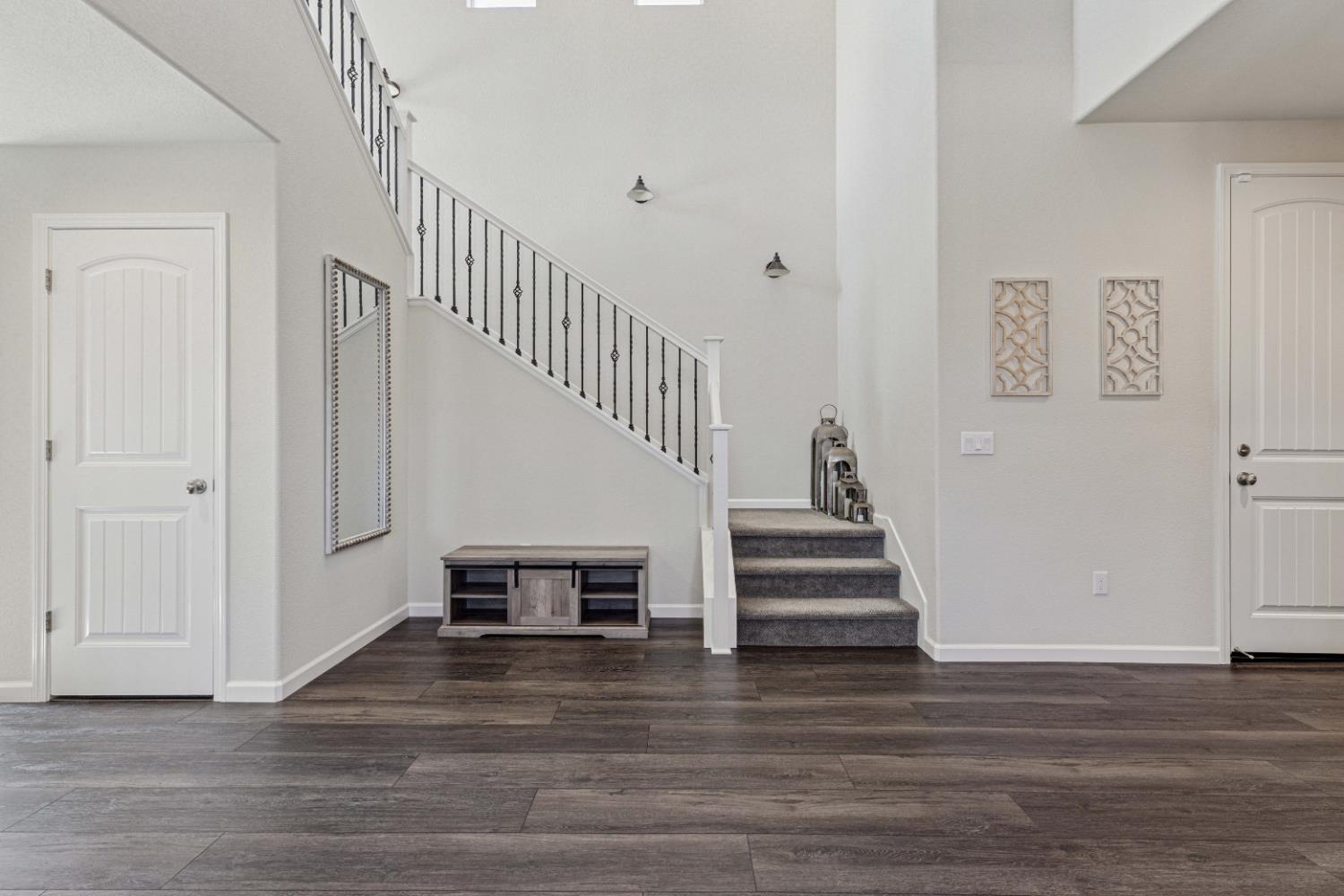 3264 Showcase Way Modesto, CA 95356 - Photo 17 of 31 a view of entryway and hall with wooden floor