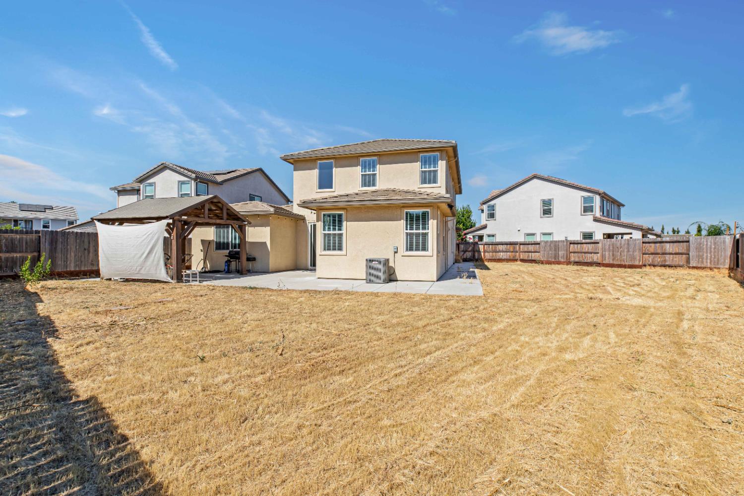 3264 Showcase Way Modesto, CA 95356 - Photo 26 of 31 a front view of a house with a yard