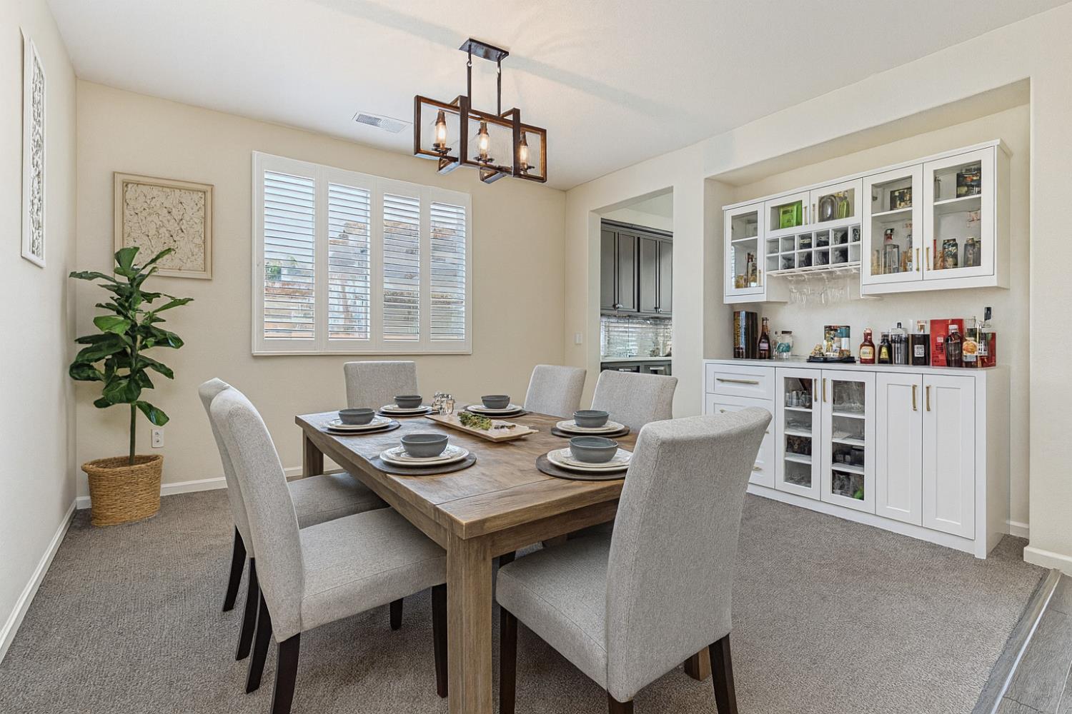 3264 Showcase Way Modesto, CA 95356 - Photo 8 of 31 a view of a dining room with furniture window and outside view