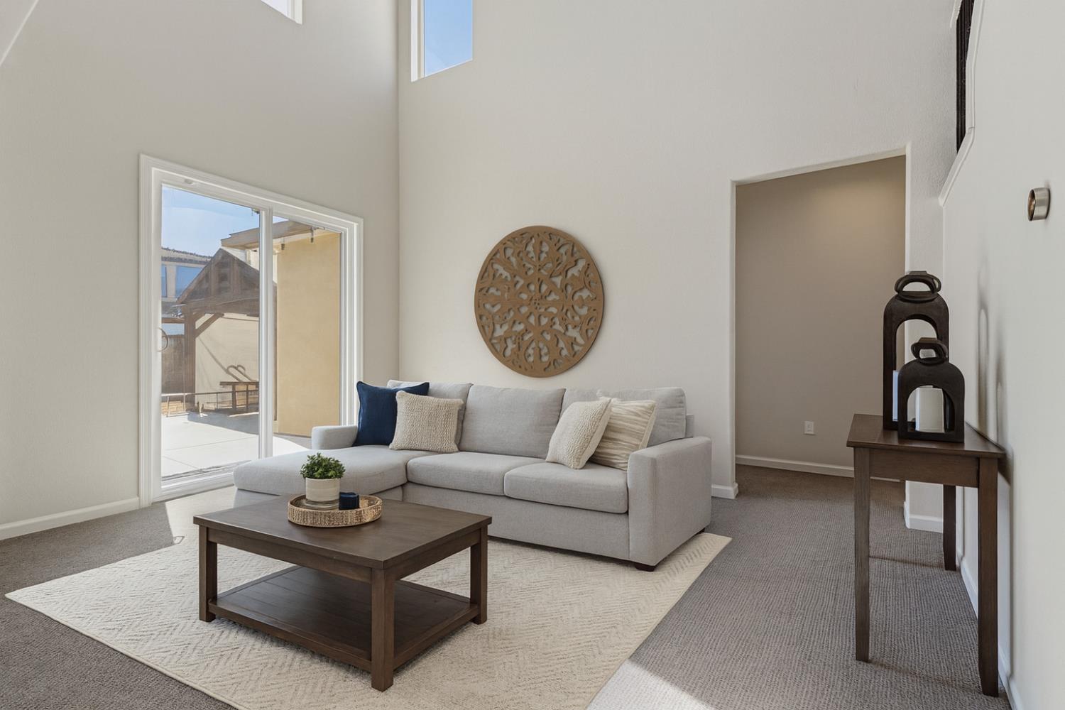 3264 Showcase Way Modesto, CA 95356 - Photo 9 of 31 a living room with furniture a window and wall painting