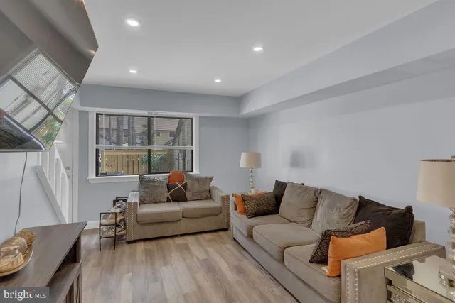 a living room with furniture and a couch