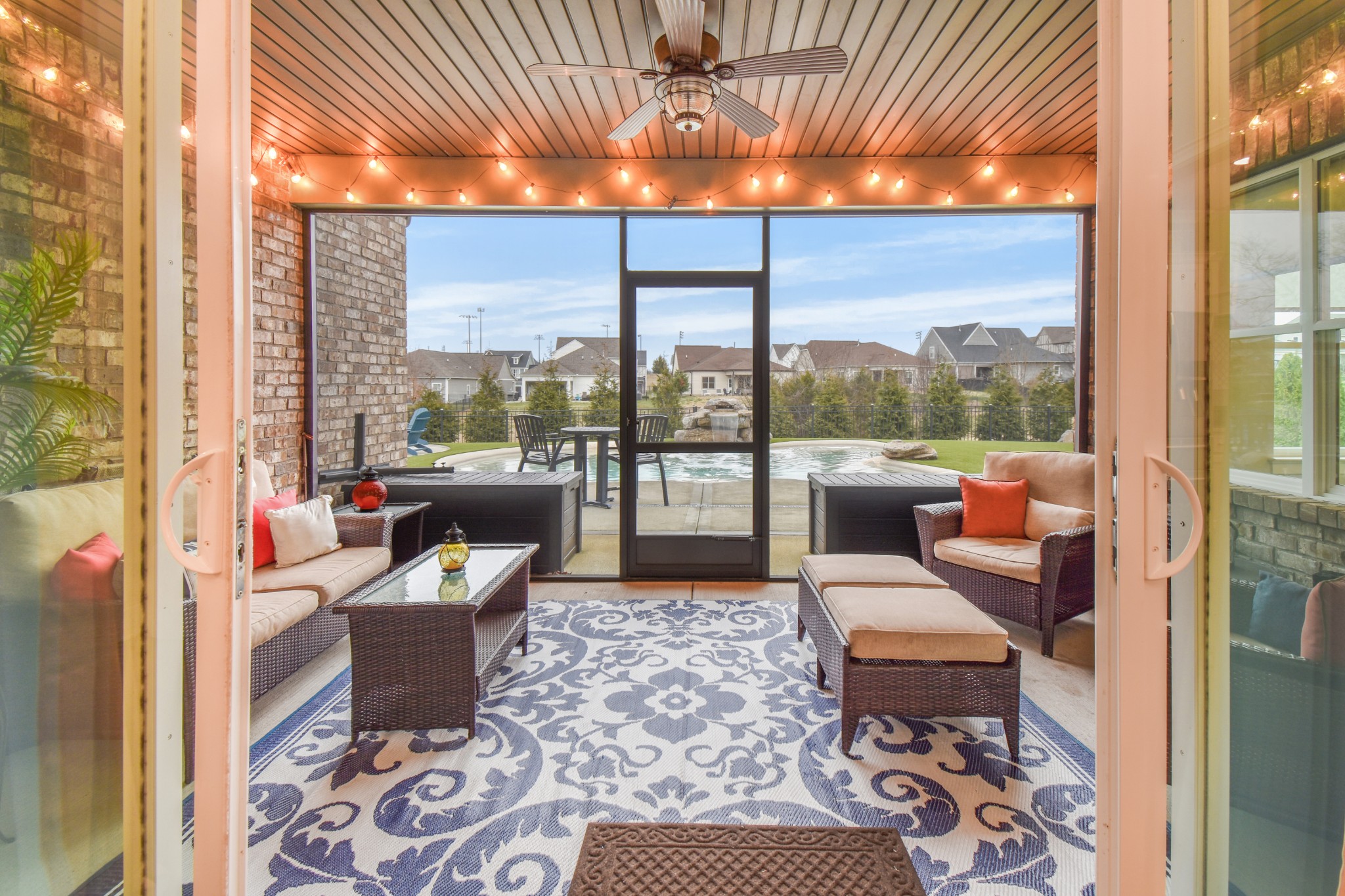 243 Croft Way Mount Juliet, TN 37122 - Photo 31 of 48 a living room with patio furniture and a floor to ceiling window