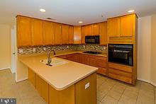 4800 Coyle Road, Unit 209 Owings Mills, MD 21117 - Photo 14 of 38 View of Kitchen from Family Room