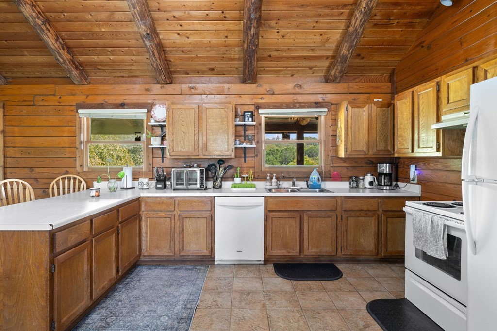 0 F-M 963 Briggs, TX 78608 - Photo 16 of 40 a kitchen with a sink cabinets and window