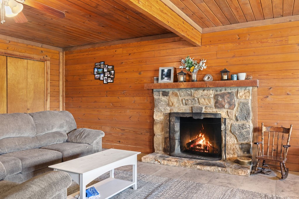 0 F-M 963 Briggs, TX 78608 - Photo 19 of 40 a living room with furniture and a fireplace