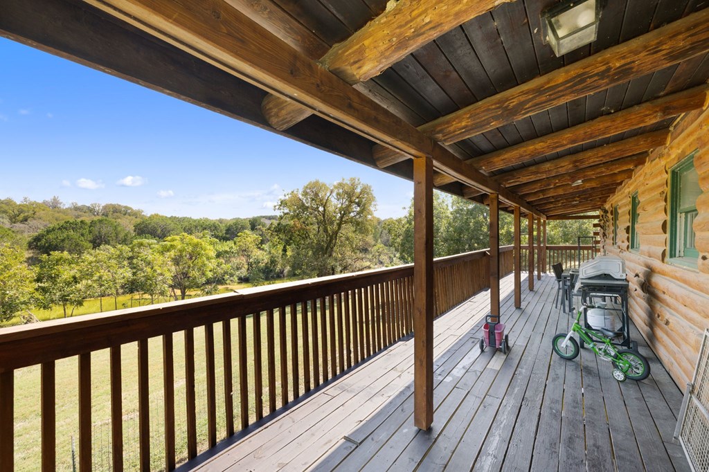 0 F-M 963 Briggs, TX 78608 - Photo 23 of 40 a view of a balcony with wooden floor