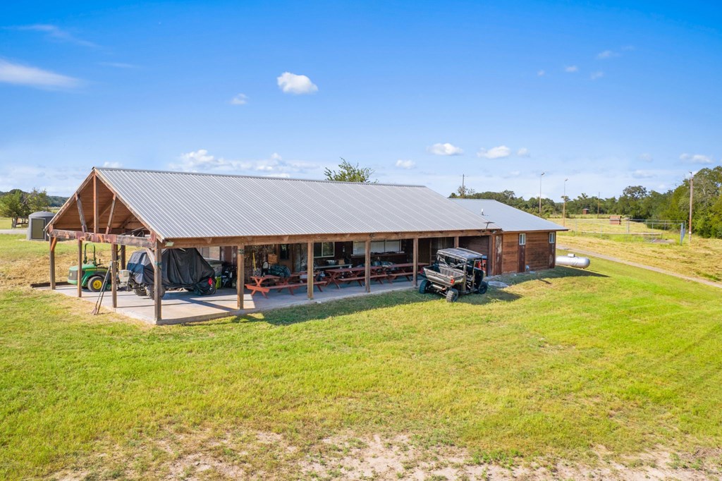 0 F-M 963 Briggs, TX 78608 - Photo 28 of 40 a view of a house with swimming pool and sitting area