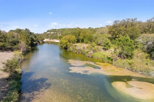 a view of a lake with mountains in the background