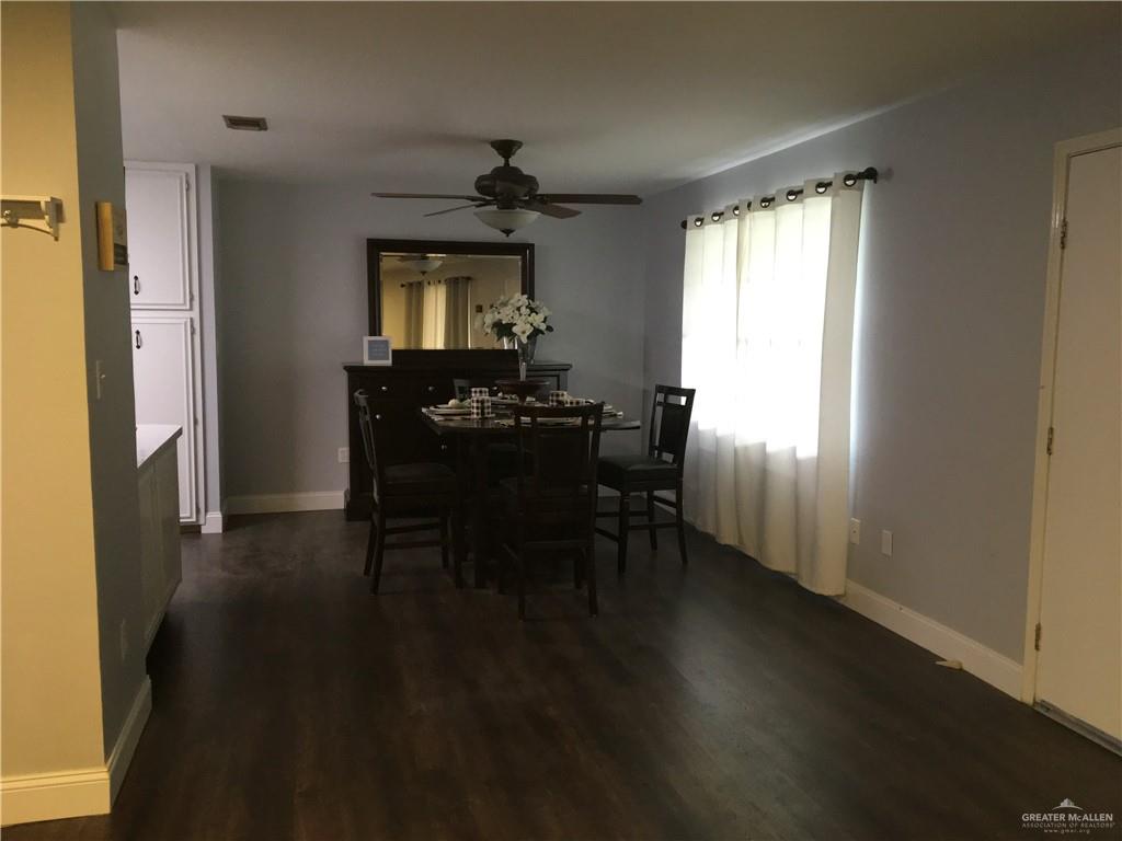 700 Fern Street, Unit 4 McAllen, TX 78504 - Photo 4 of 14 a dining room with furniture and window