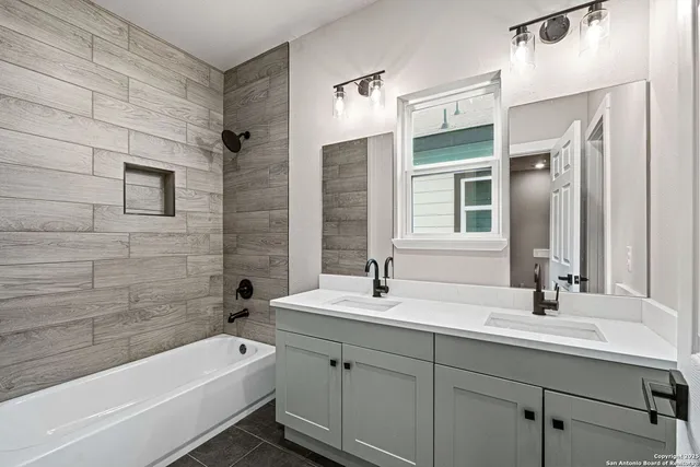 an empty room with a empty space and windows