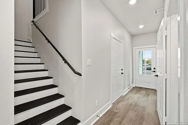 a bathroom with a sink and mirror