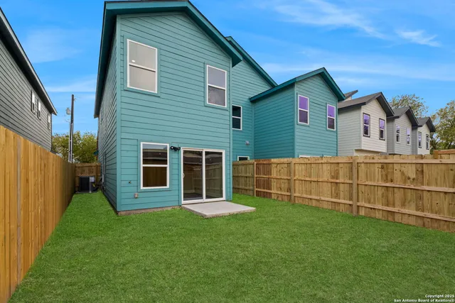 a group of some couches under an umbrella