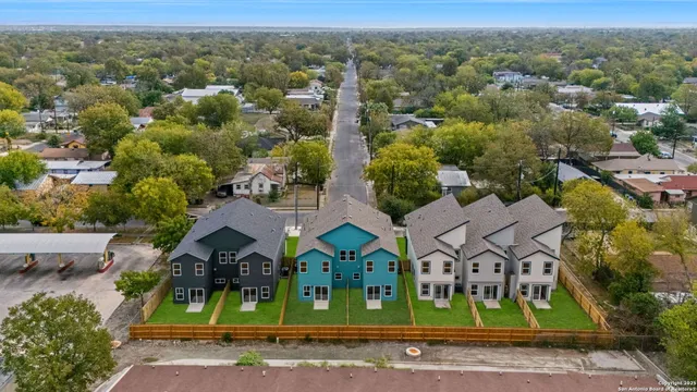 an aerial view of a house with a garden