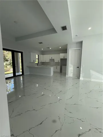 a view of a livingroom with a window