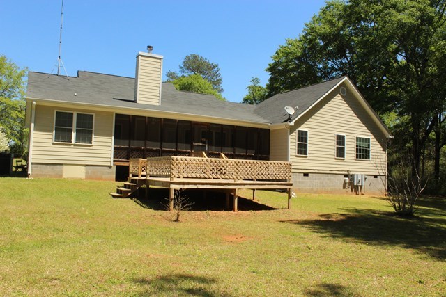 11 Dillard Road Forsyth, GA 31029 - Photo 12 of 14 a front view of a house with swimming pool