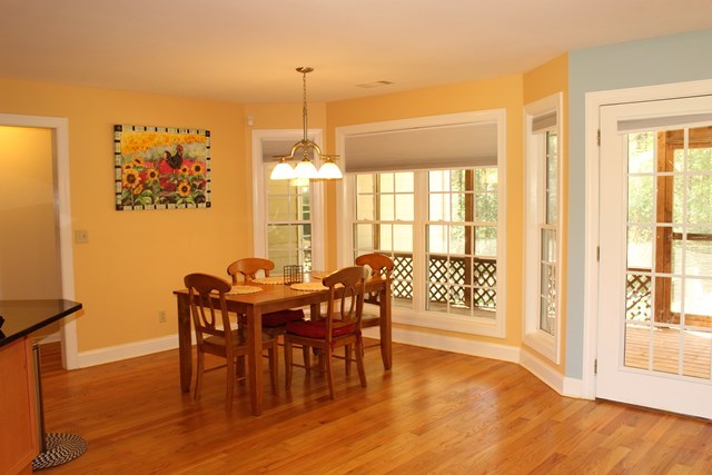 11 Dillard Road Forsyth, GA 31029 - Photo 4 of 14 a view of a dining room with furniture window and wooden floor