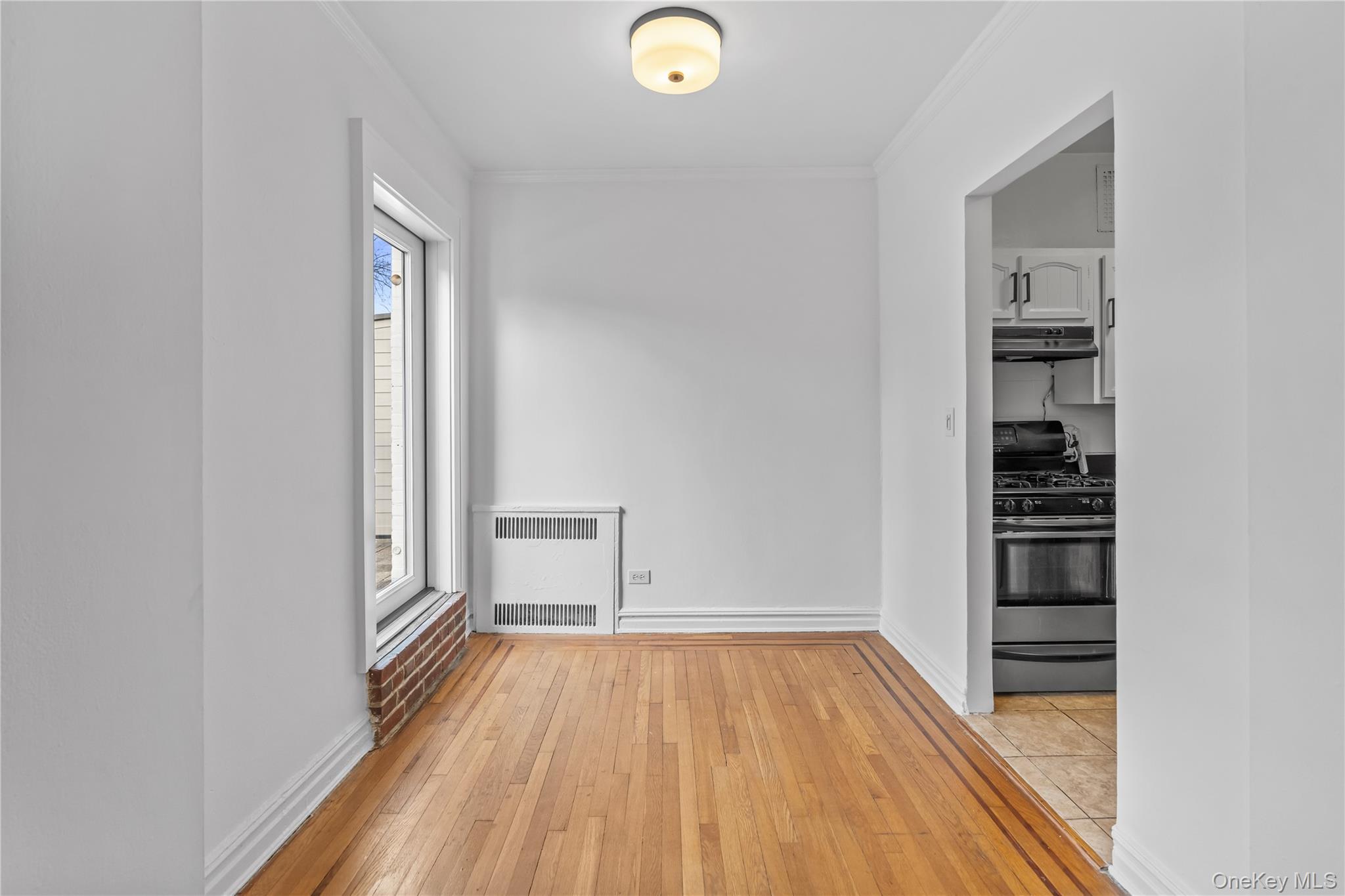 822 Palmer Road, Unit 3B Bronxville, NY 10708 - Photo 6 of 19 a view of a room with wooden floor and closet