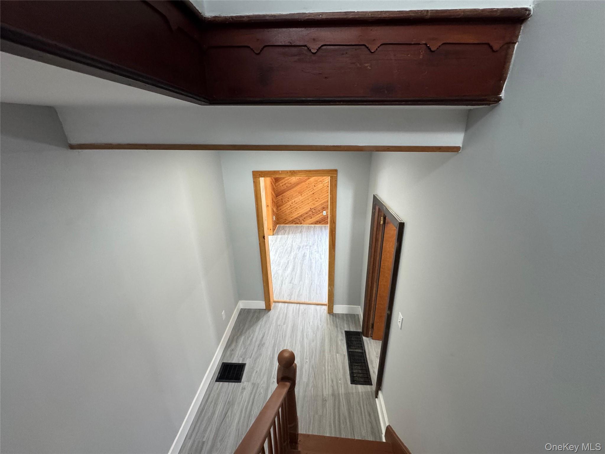 9606 Lincoln Avenue Remsen, NY 13438 - Photo 11 of 43 Hall featuring baseboards and wood finished floors