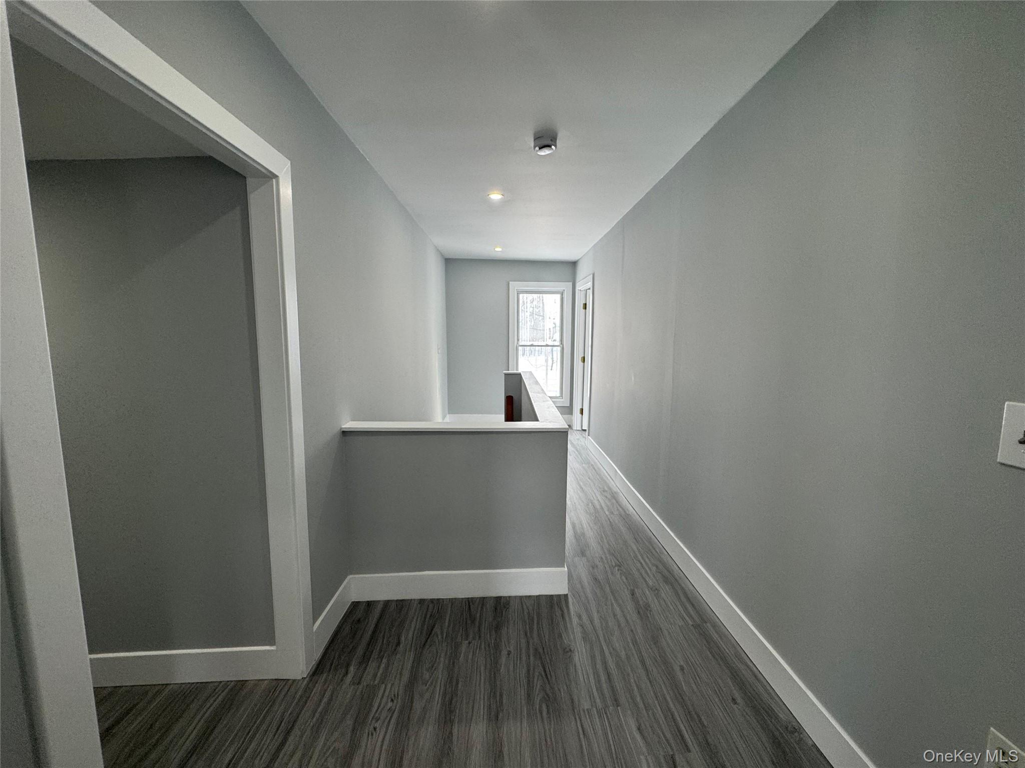 9606 Lincoln Avenue Remsen, NY 13438 - Photo 16 of 47 a view of hallway with wooden floor