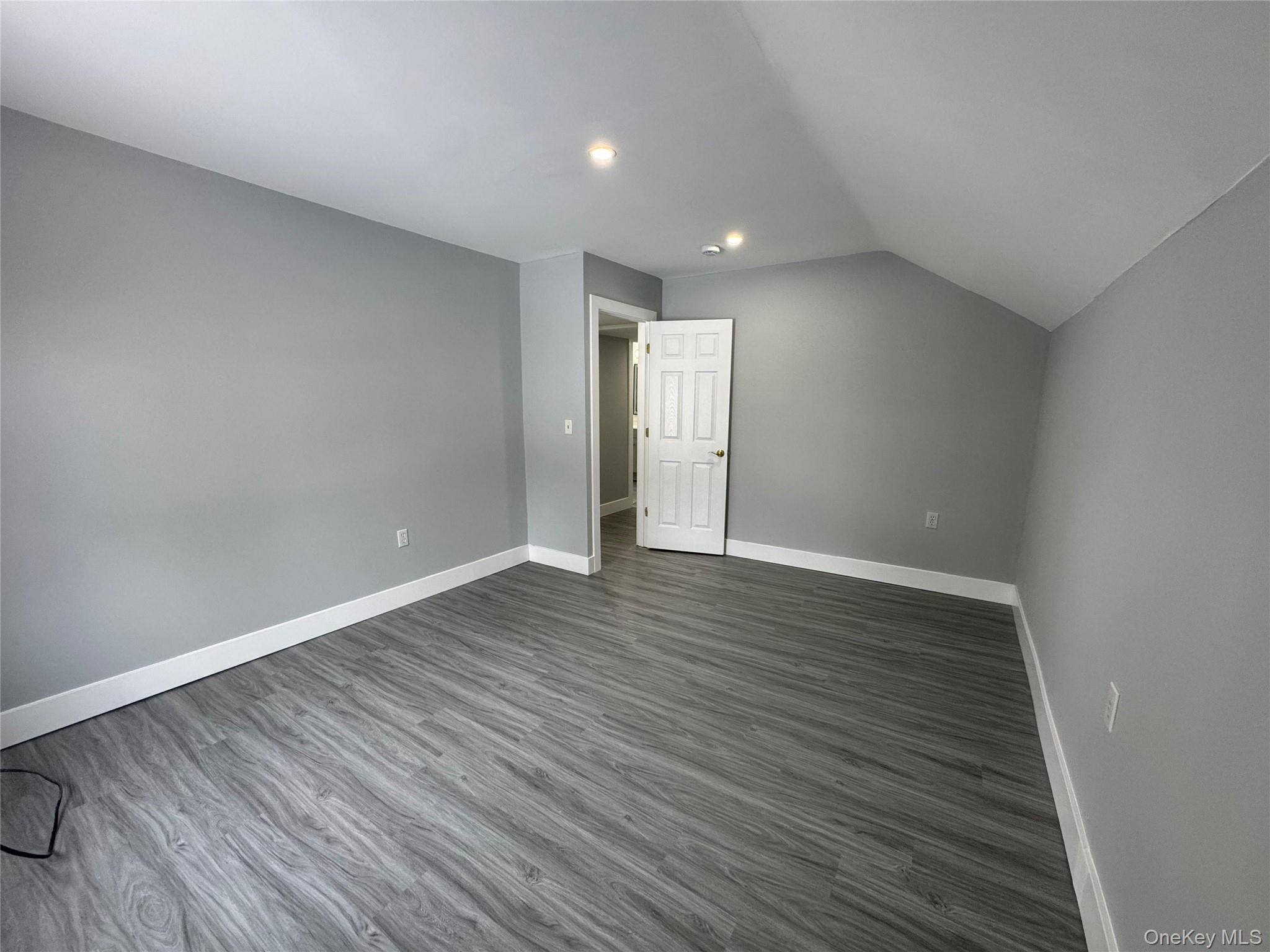 9606 Lincoln Avenue Remsen, NY 13438 - Photo 24 of 47 a view of an empty room with wooden floor
