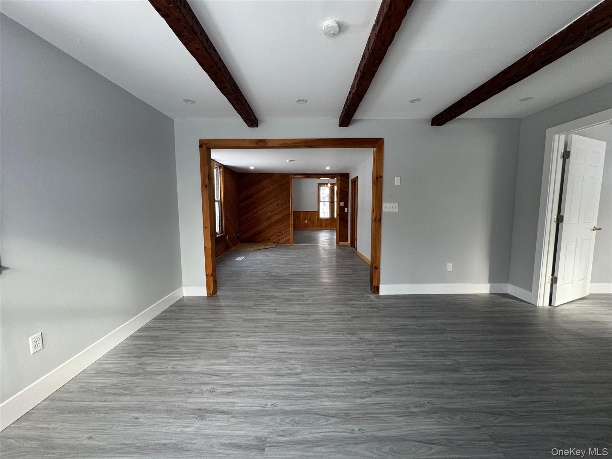 9606 Lincoln Avenue Remsen, NY 13438 - Photo 32 of 47 a view of an empty room with wooden floor and a window