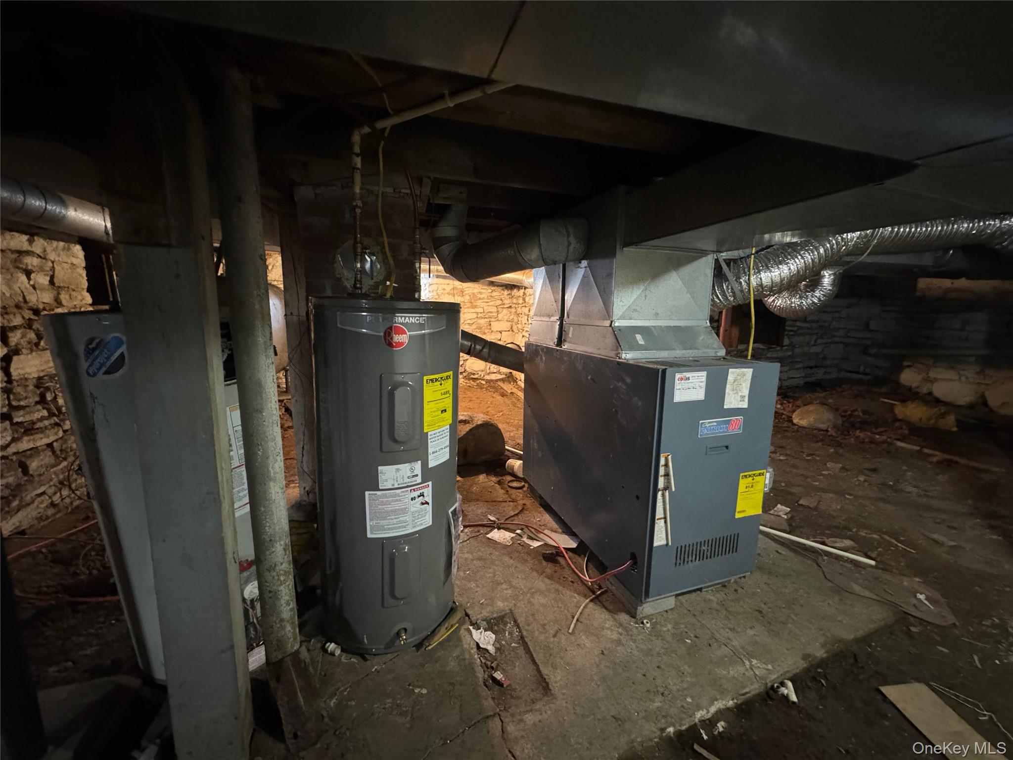 9606 Lincoln Avenue Remsen, NY 13438 - Photo 42 of 43 Utility room with electric water heater, heating unit, and water heater
