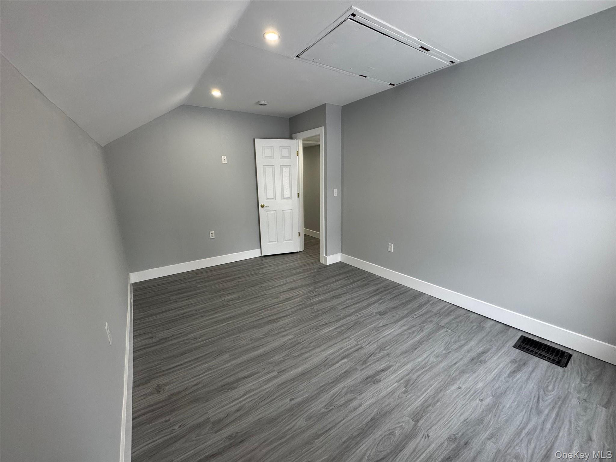 9606 Lincoln Avenue Remsen, NY 13438 - Photo 44 of 47 a view of an empty room with wooden floor