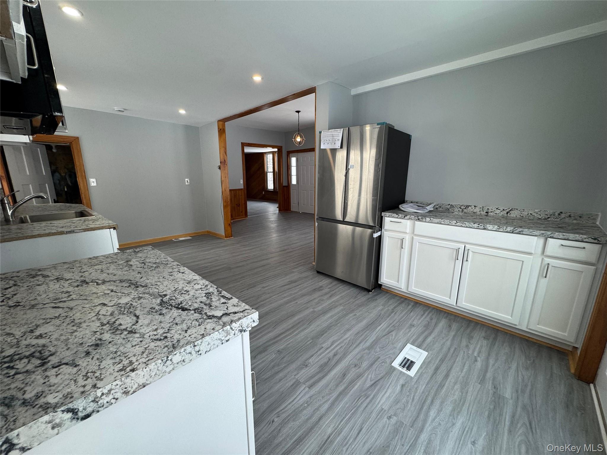 9606 Lincoln Avenue Remsen, NY 13438 - Photo 10 of 47 a kitchen with a sink and refrigerator