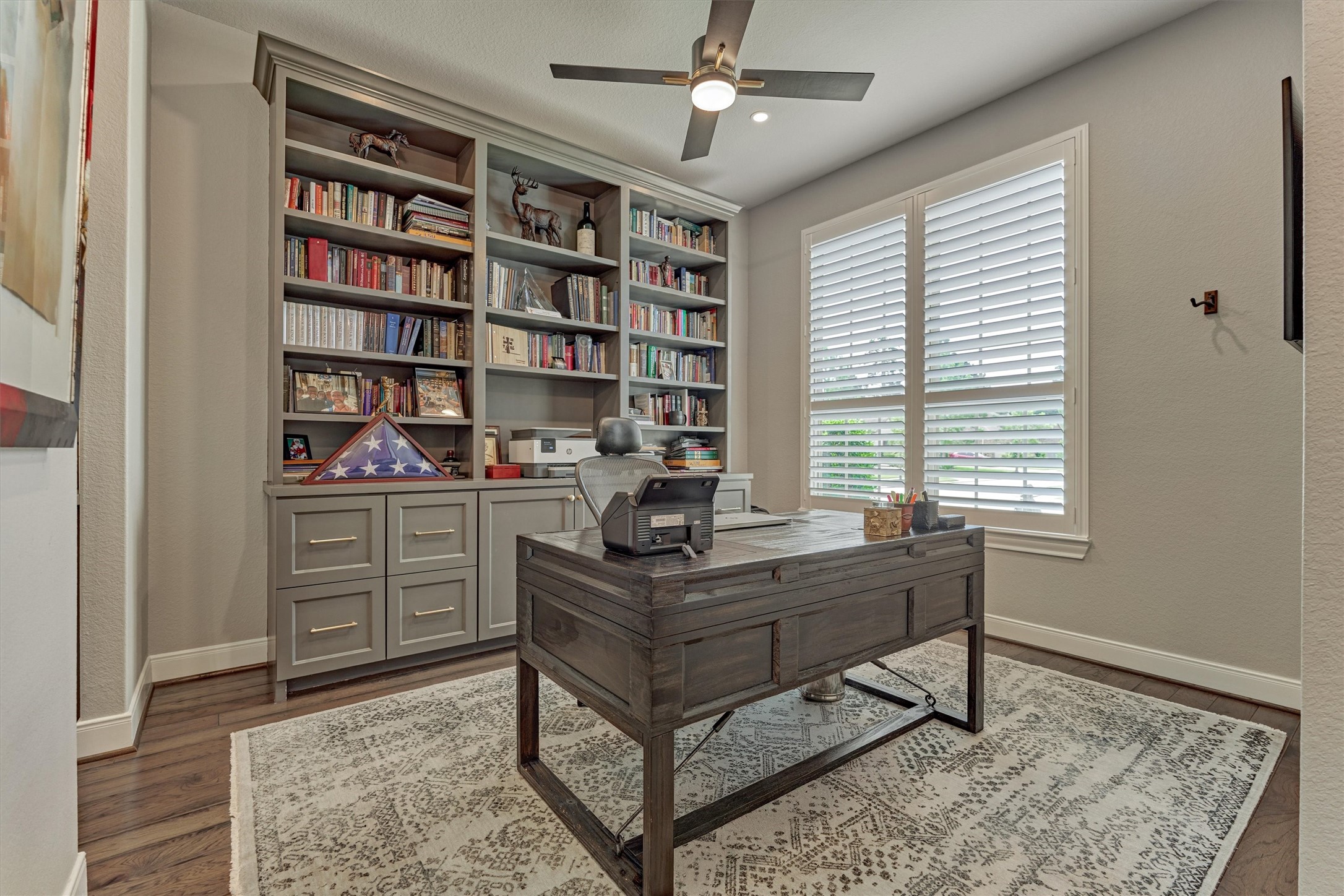 108 Wild Wick Way Spring, TX 77382 - Photo 11 of 44 The Office Space Is Situated Off The Front Entry; Note The Handsome Built-In, Modern Ceiling Fan, And Clear View Plantation Shutters.