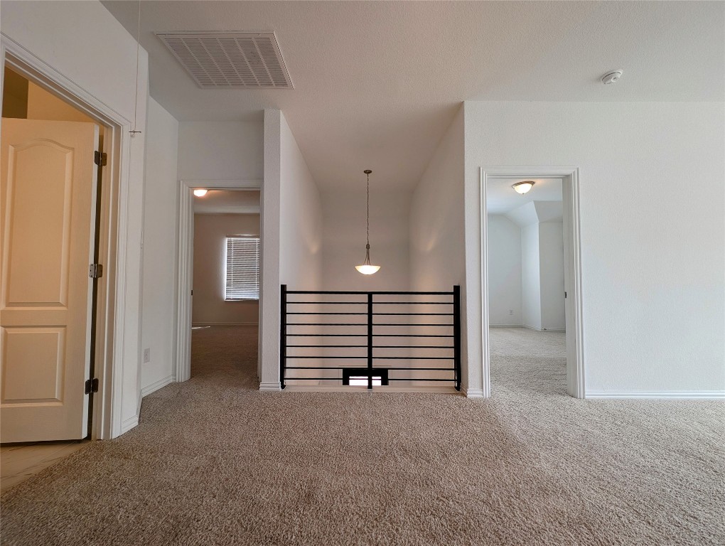 1344 Ridge Runner Drive Georgetown, TX 78628 - Photo 25 of 37 wooden floor in an empty room with a window