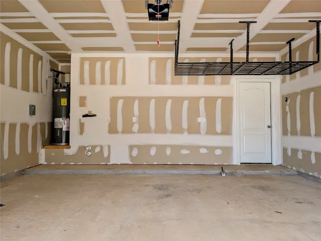 a front view of a house with garage