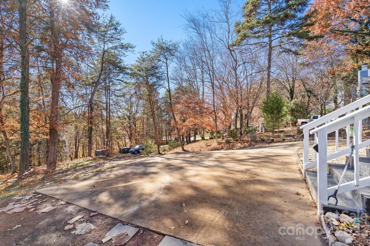 9099 Pitcairn Drive Tega Cay, SC 29708 - Photo 2 of 21 a view of outdoor space with yard