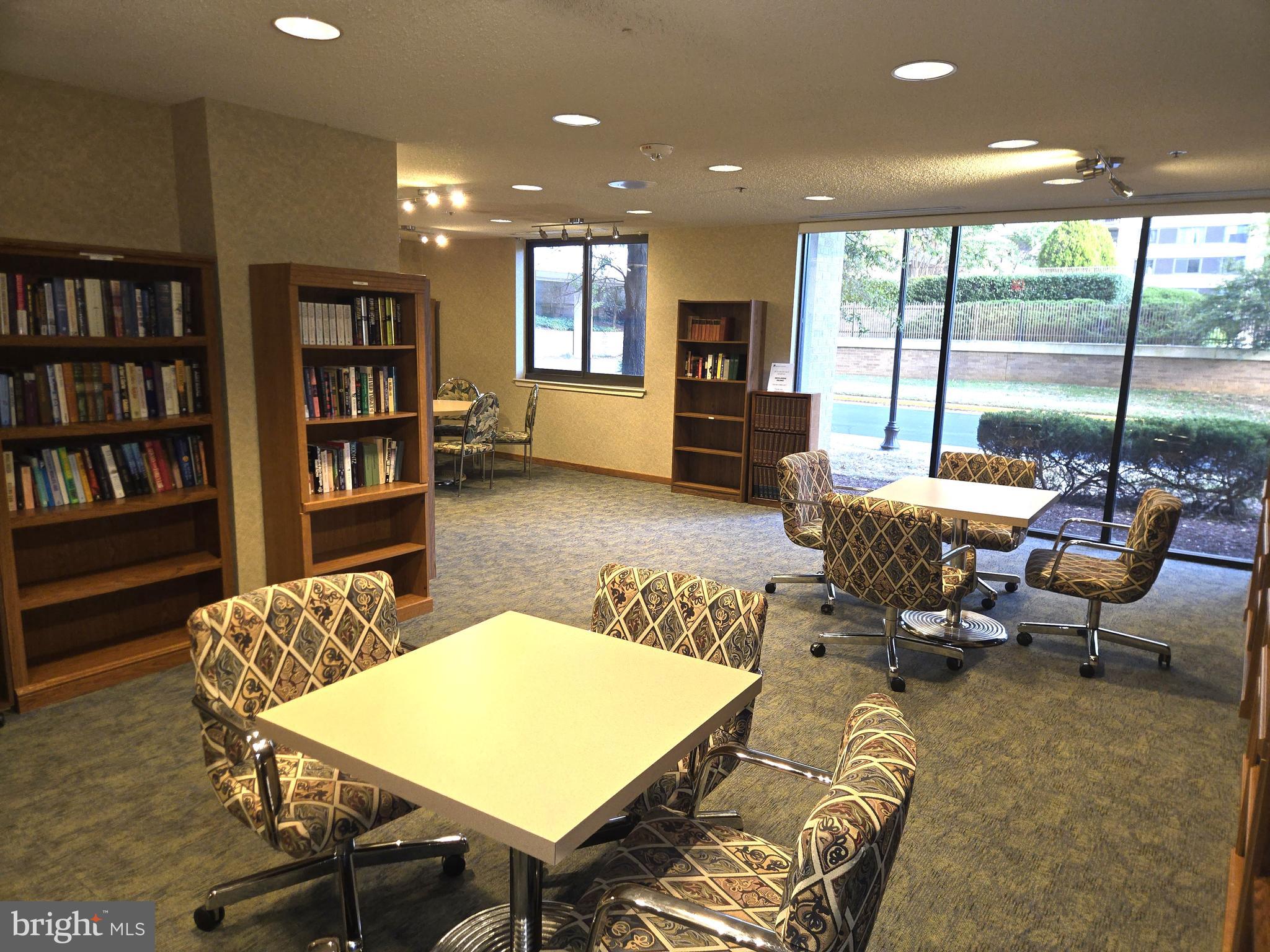 5501 Seminary Road, Unit 214S Falls Church, VA 22041 - Photo 21 of 27 a living room with furniture and a book shelf