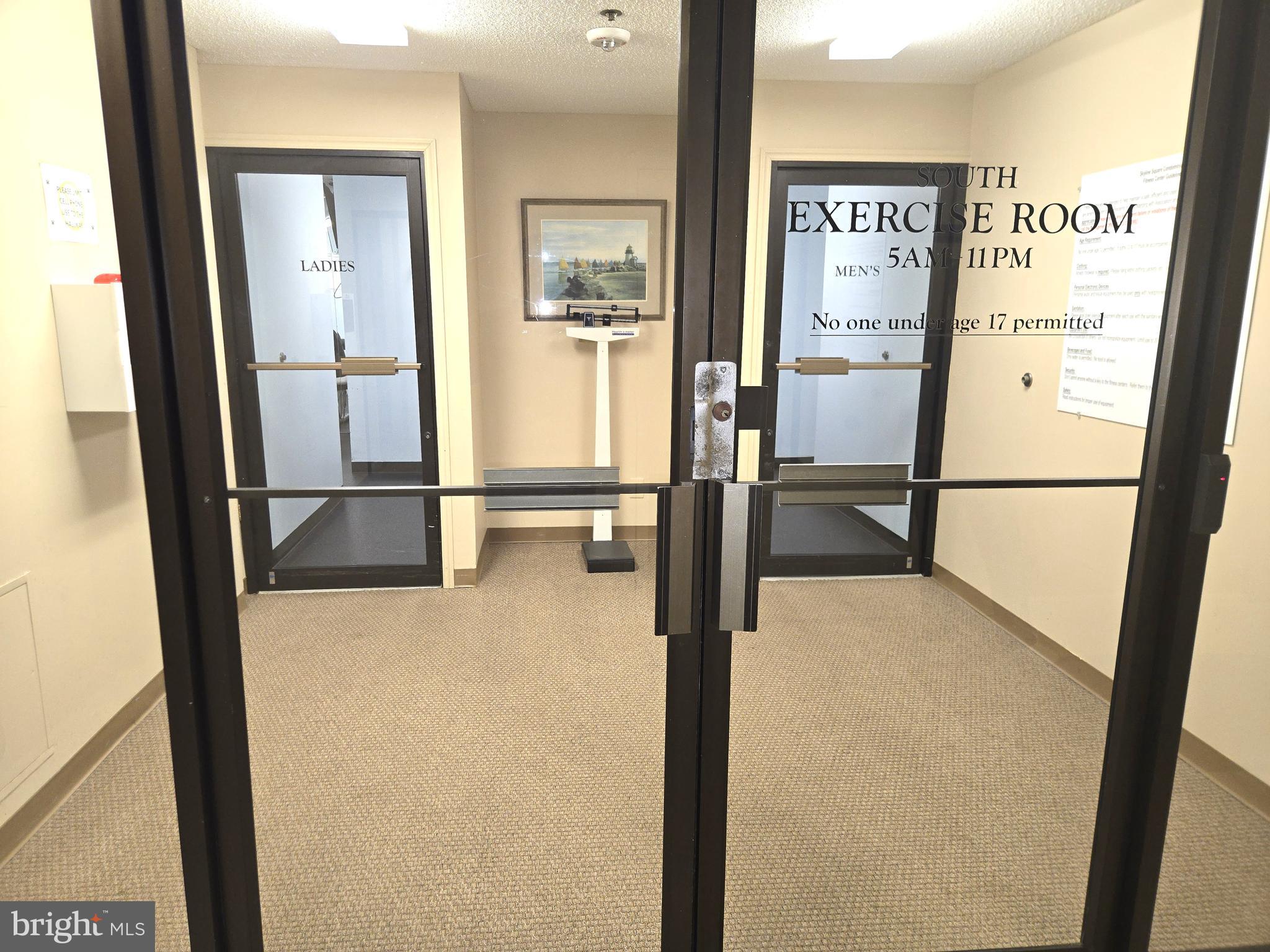 5501 Seminary Road, Unit 214S Falls Church, VA 22041 - Photo 24 of 27 a view of a hallway with a refrigerator and mirror