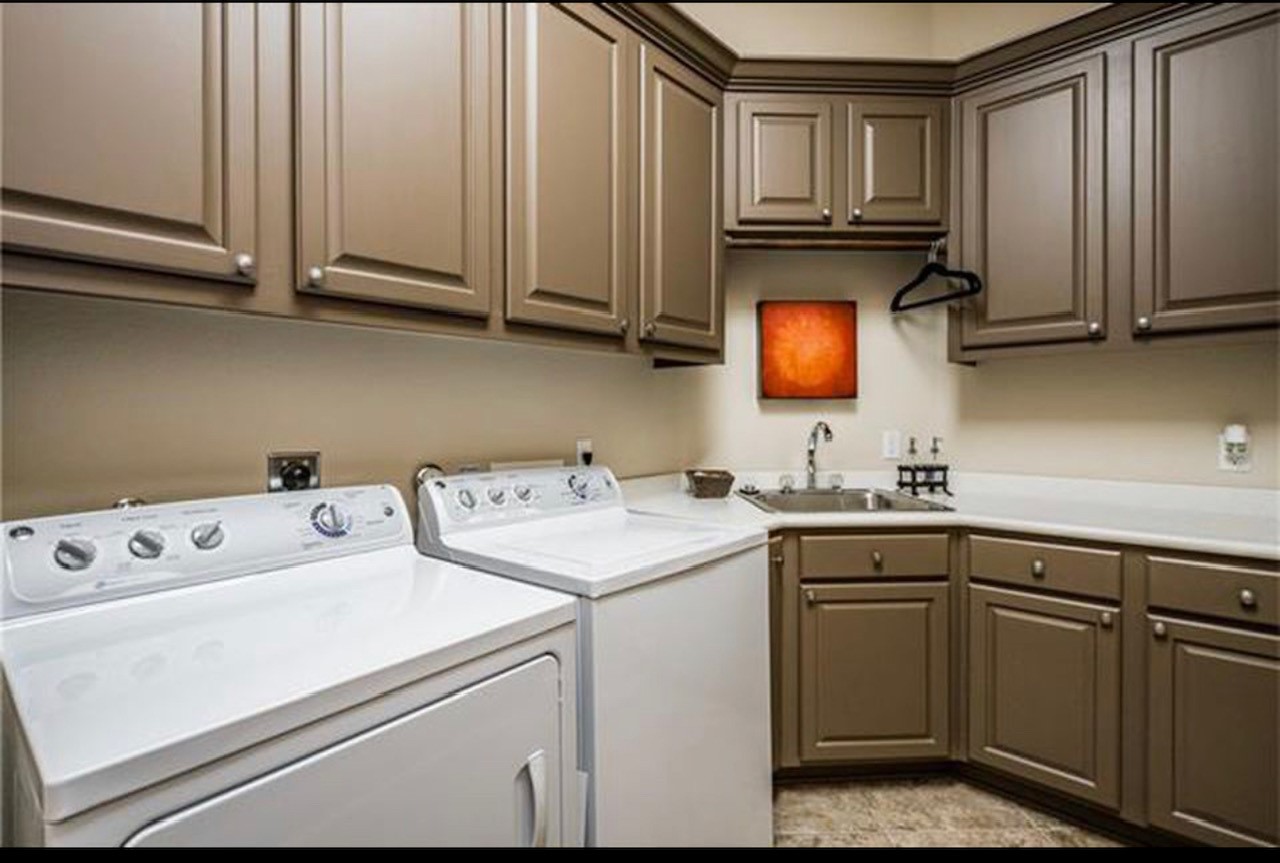 122 Sebastians Run Austin, TX 78738 - Photo 28 of 39 Spacious laundry room with lots of storage