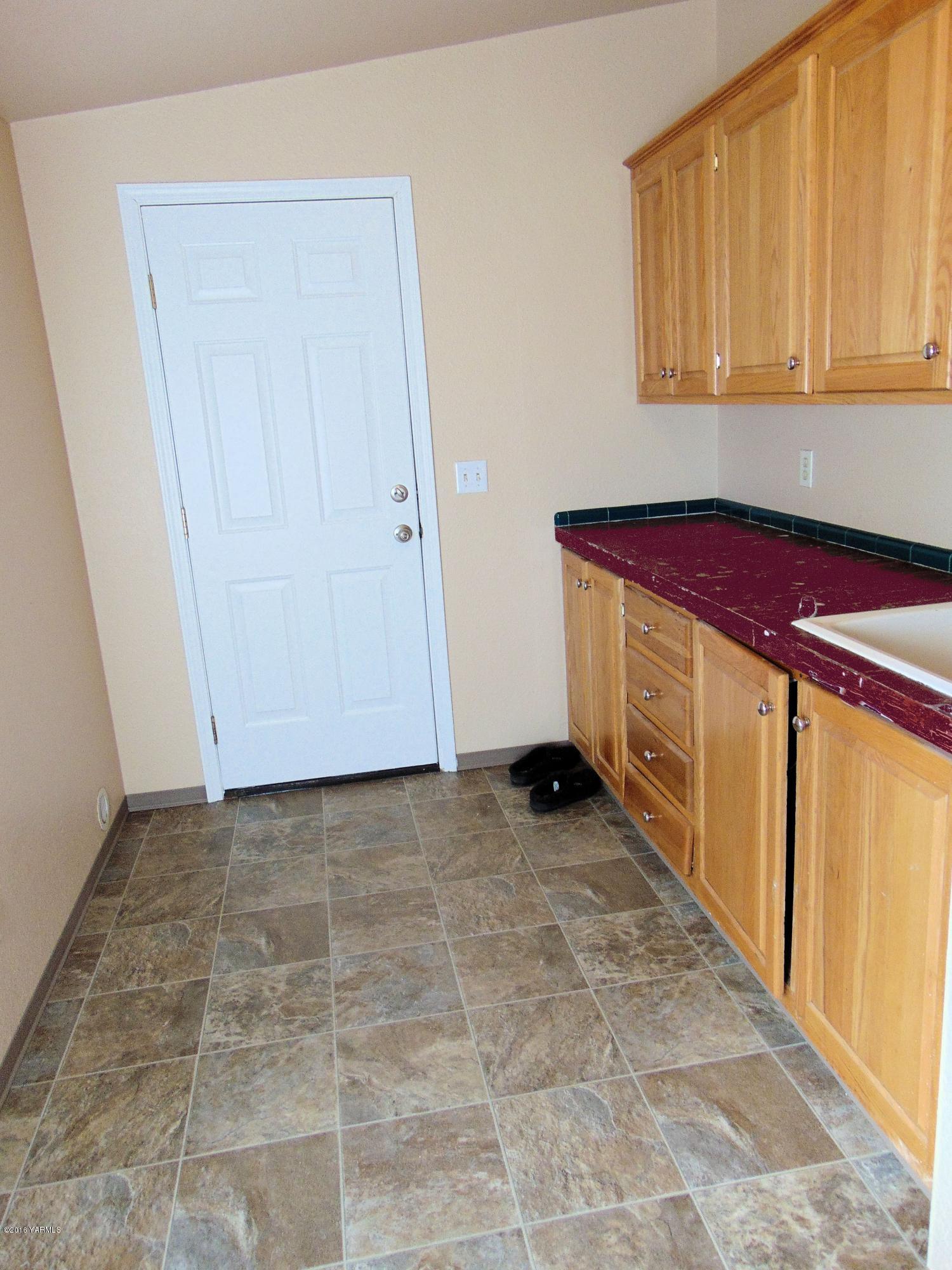 151 Cook Road Yakima, WA 98908 - Photo 11 of 13 a view of a storage and utility room in front door
