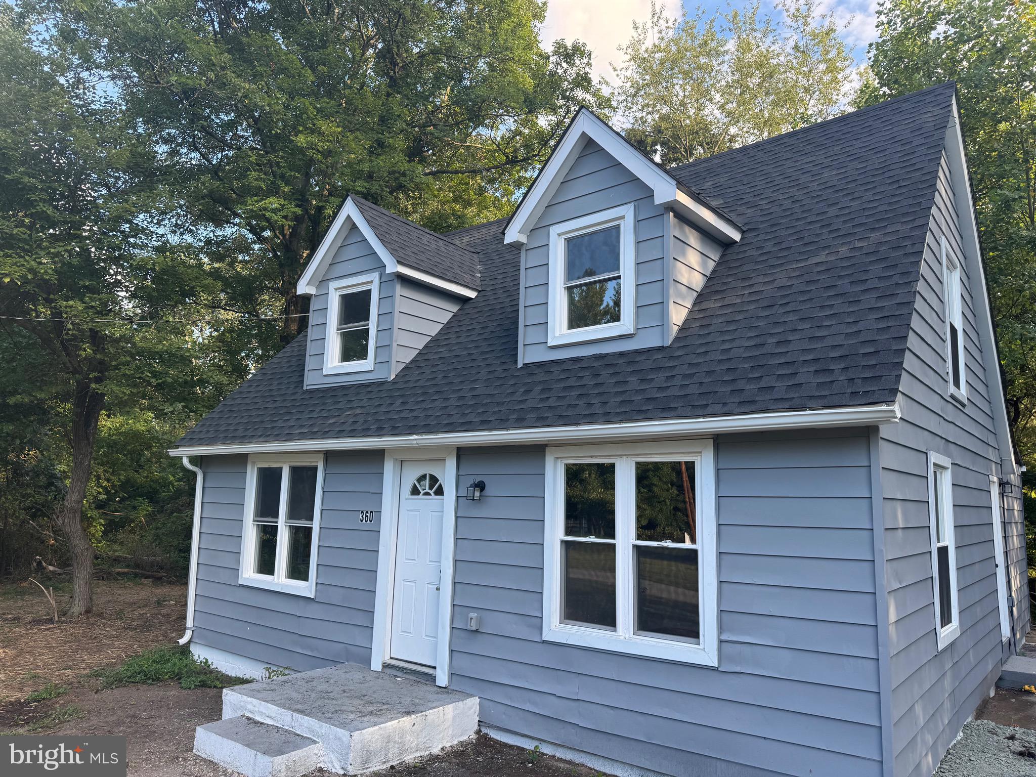 360 Nottingham Road Elkton, MD 21921 - Photo 1 of 32 a front view of a house with a yard
