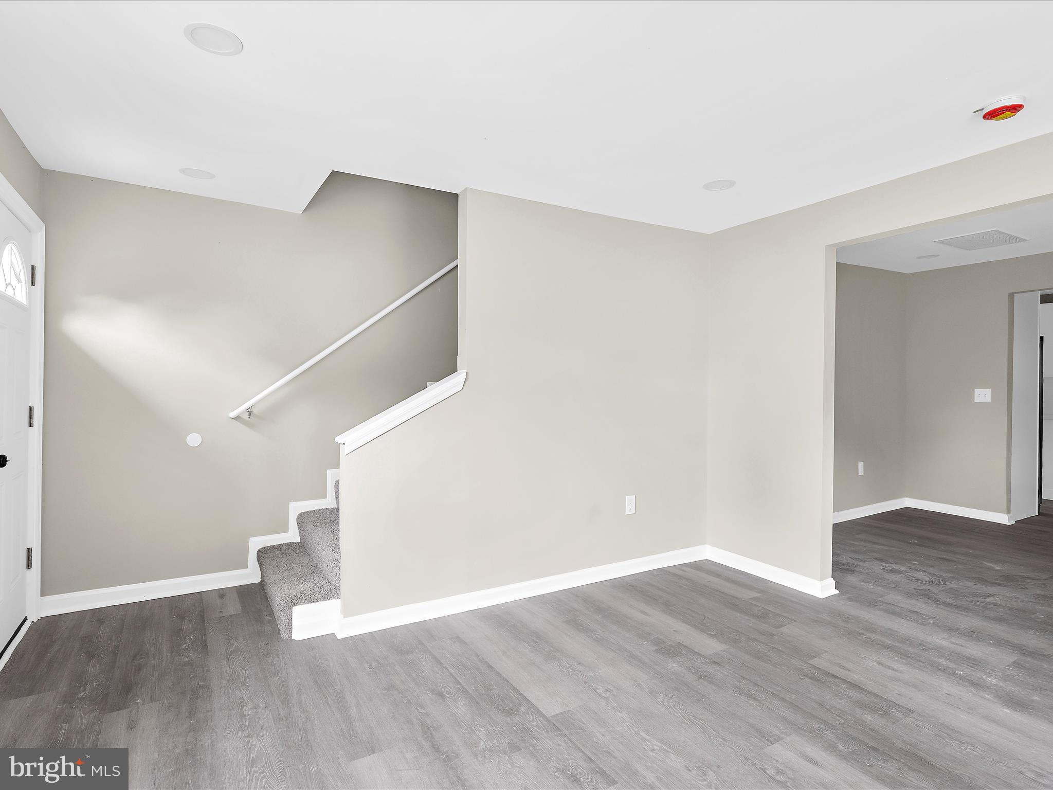 360 Nottingham Road Elkton, MD 21921 - Photo 16 of 32 a view of an empty room with wooden floor and a window