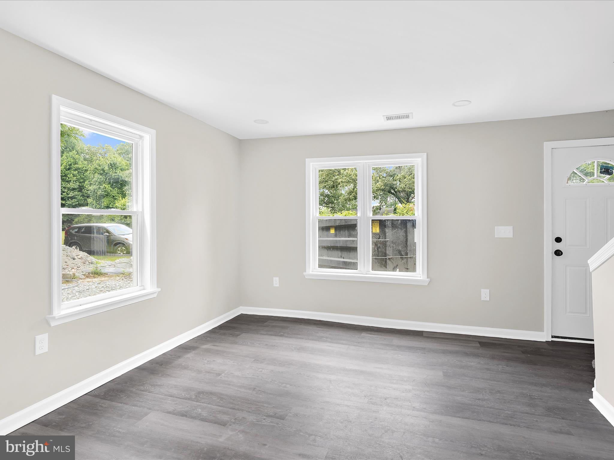 360 Nottingham Road Elkton, MD 21921 - Photo 20 of 32 an empty room with wooden floor and windows
