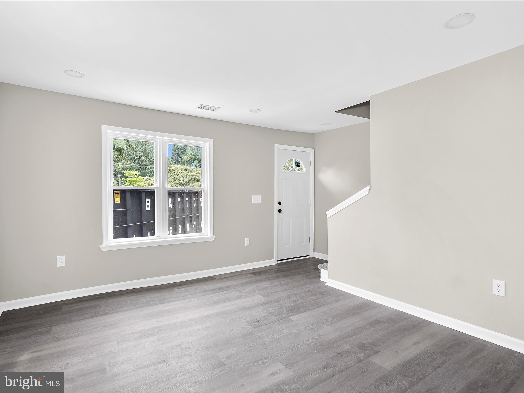 360 Nottingham Road Elkton, MD 21921 - Photo 21 of 32 an empty room with wooden floor and windows