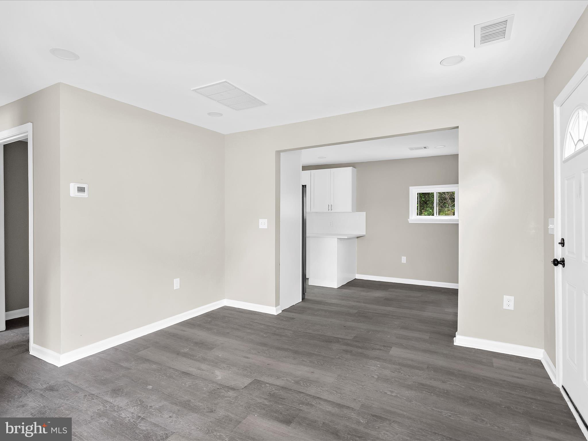 360 Nottingham Road Elkton, MD 21921 - Photo 22 of 32 a view of an empty room with wooden floor and closet
