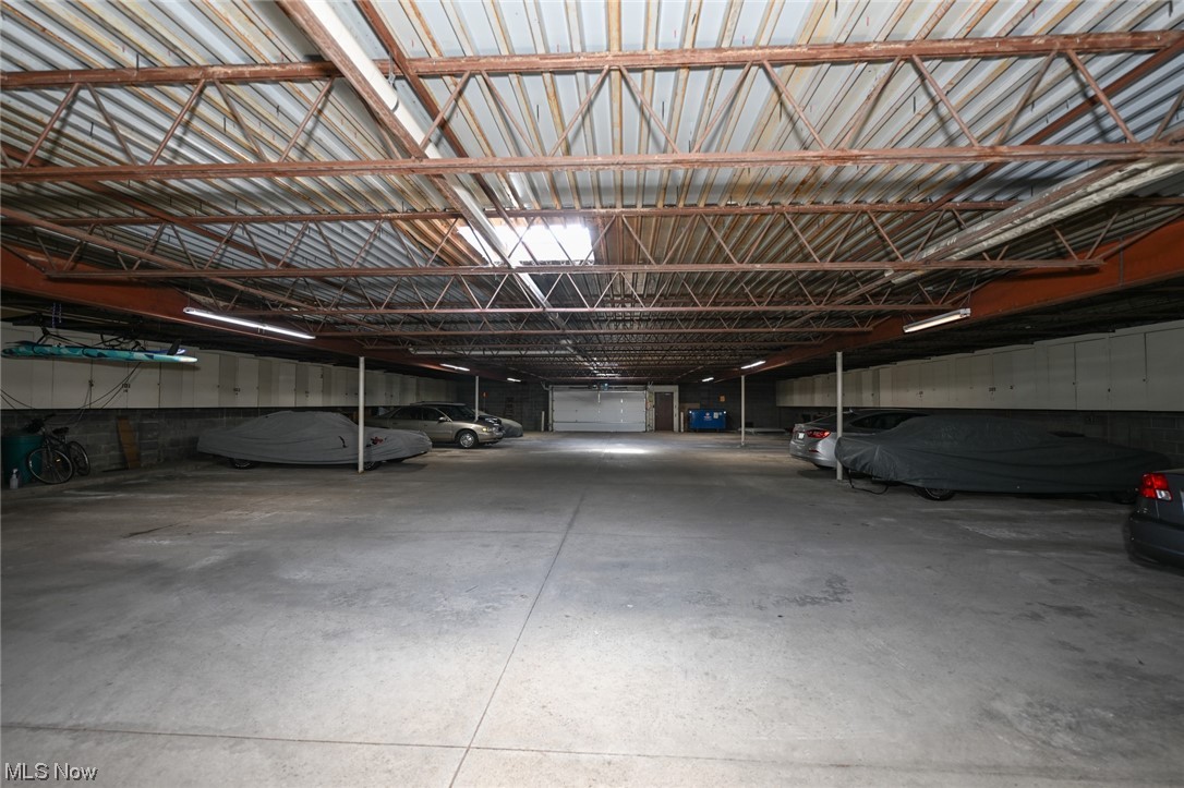 985 Canyon View Road, Unit 103 Northfield, OH 44067 - Photo 18 of 20 View from inside the detached garage. This unit has one parking spot inside with storage cabinets.