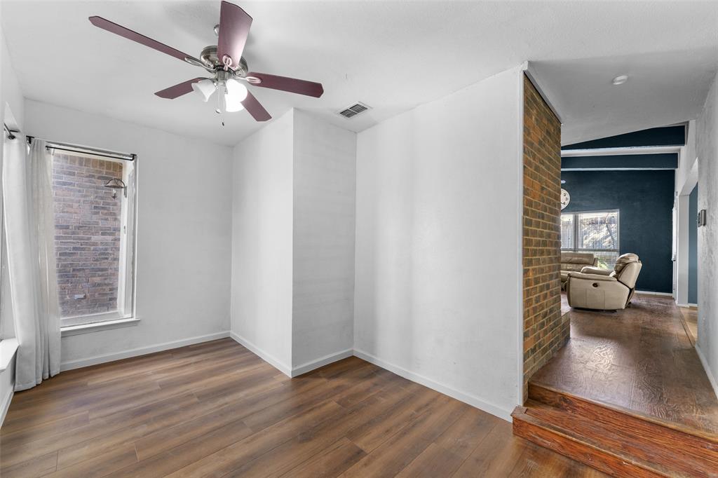 2127 Holt Road Arlington, TX 76006 - Photo 6 of 18 a view of a livingroom with a chandelier