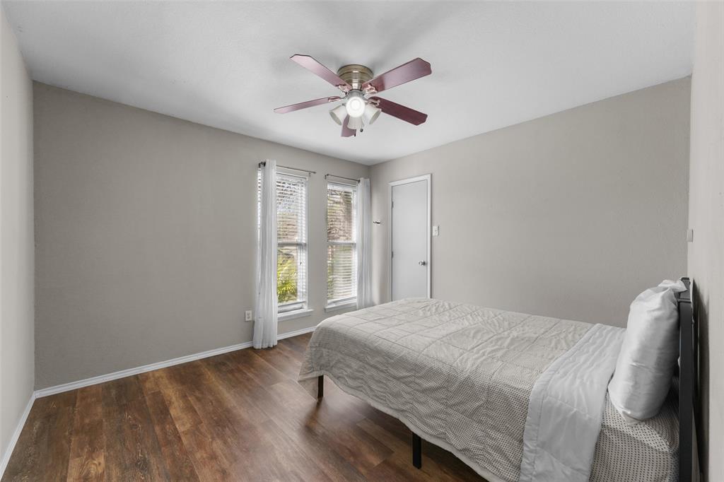 2127 Holt Road Arlington, TX 76006 - Photo 10 of 18 a bedroom with a bed and window
