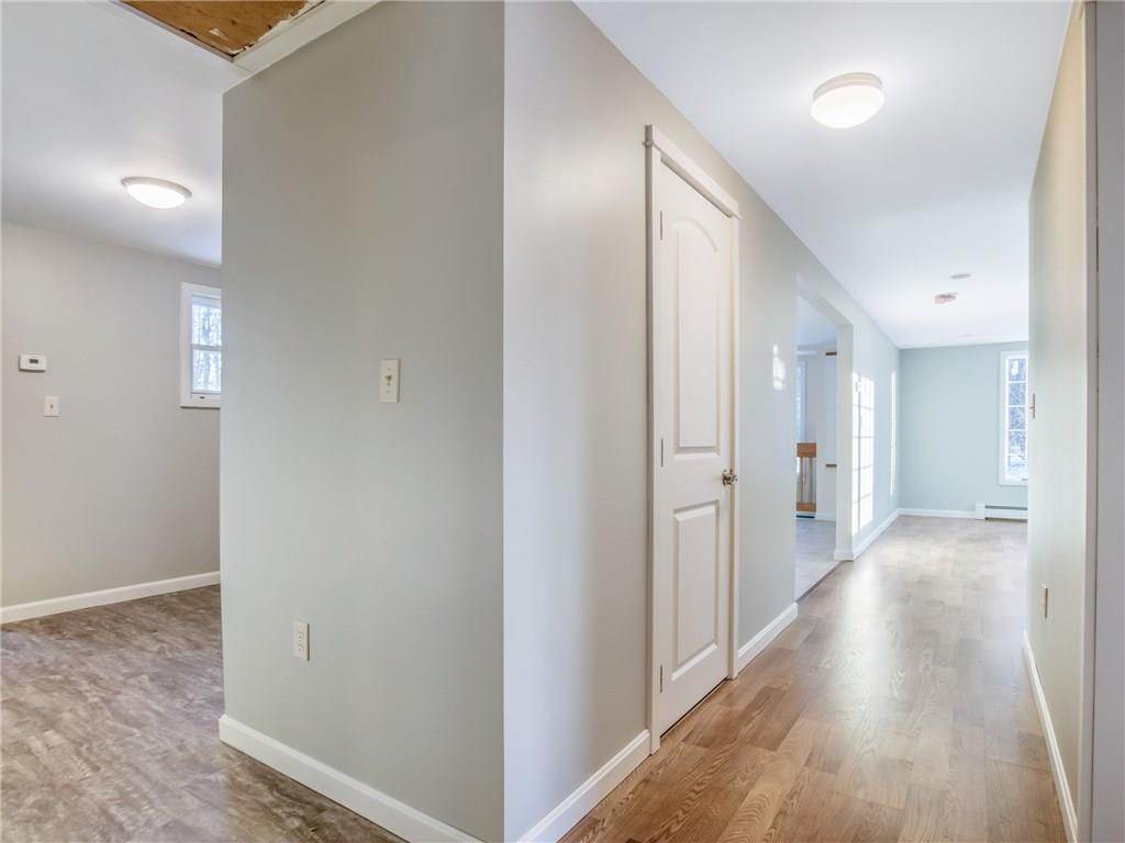 72 Winthrop Road Readfield, ME 04355 - Photo 10 of 33 Hallway leading to living room .Door...